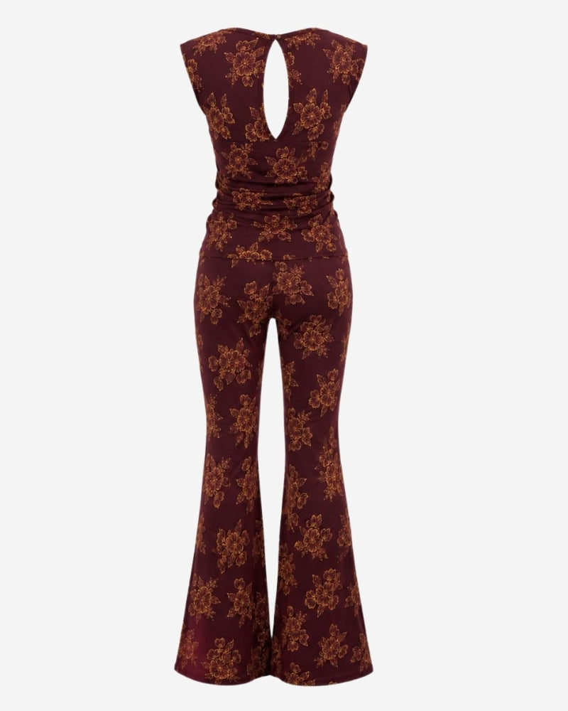 Nube Set – Floral by Lunaré – back view flat lay, burgundy floral print top and flared pants.