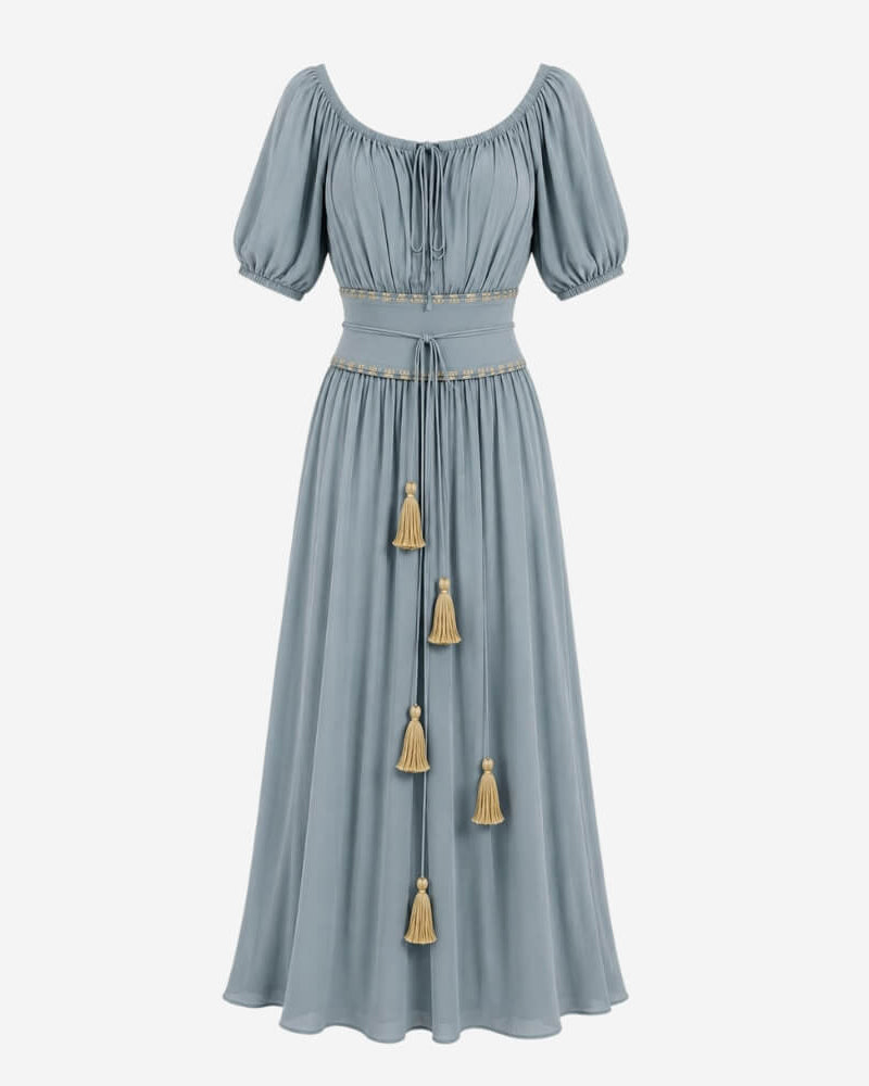 Sanaya Kim Dress by Lunaré – flat lay, dusty blue maxi dress with short puff sleeves and tasseled waist tie.