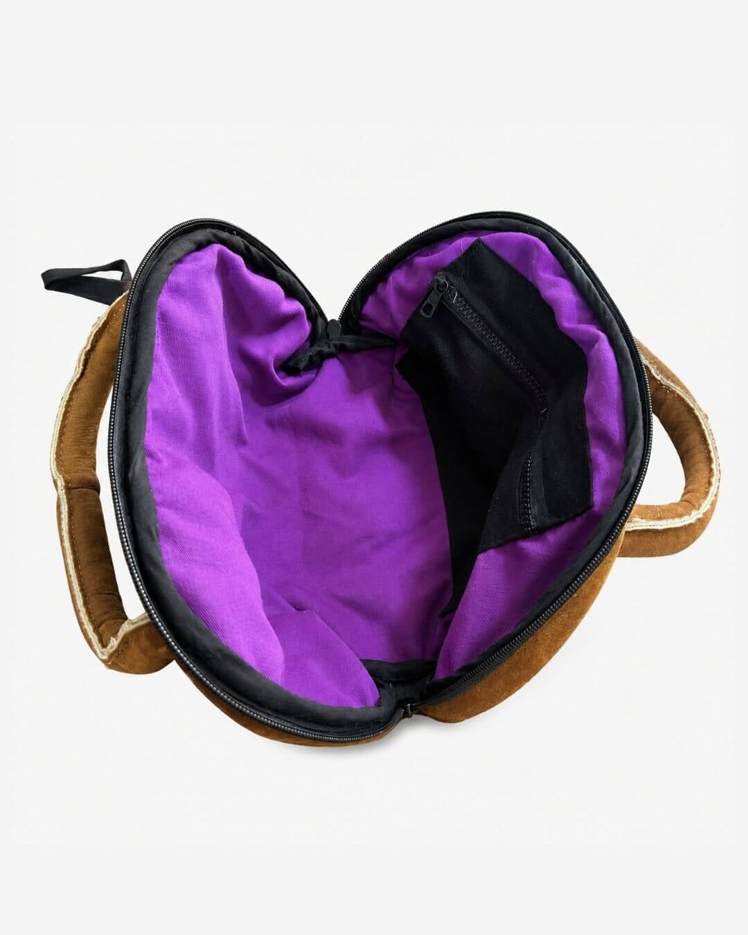 Sonja Bag by Lunaré – interior detail shot, brown suede bag with purple lining and zip pocket.