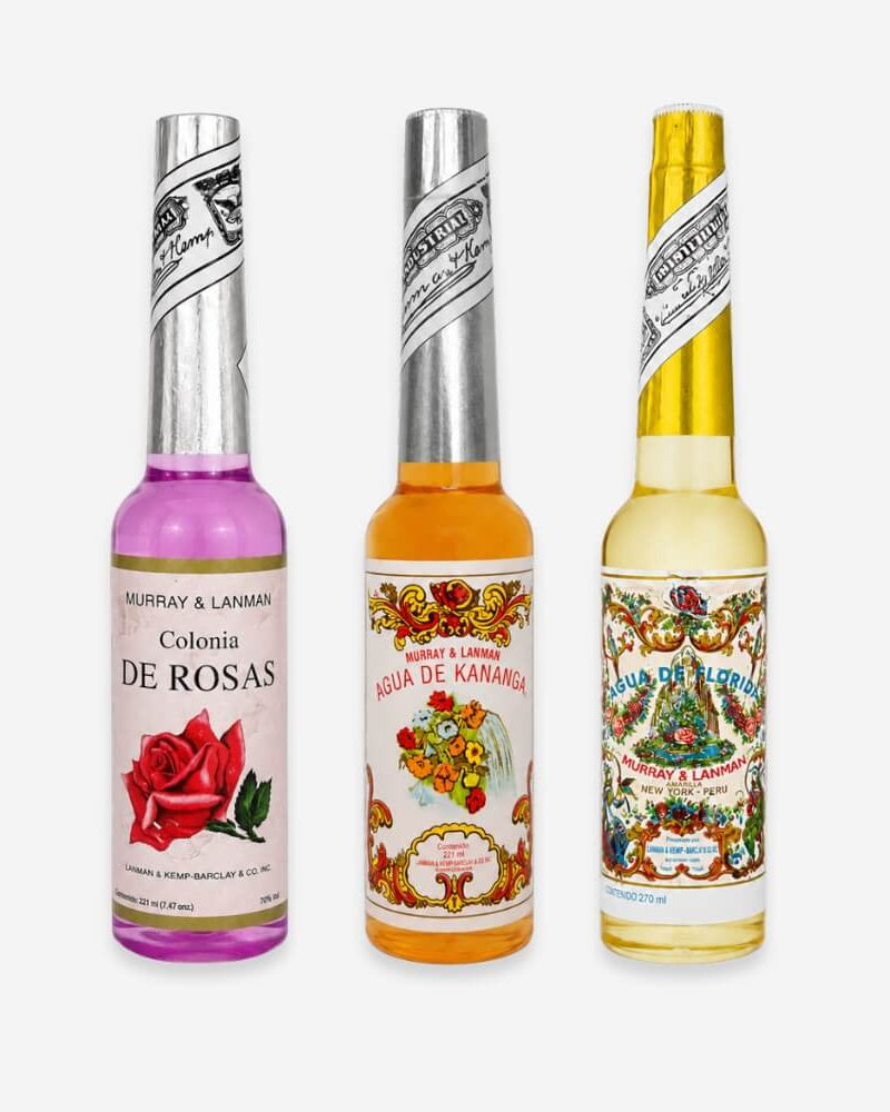 Auga de Kanaga Set by Lunaré – product shot, three fragrance bottles in rose, orange and yellow with vintage labels.