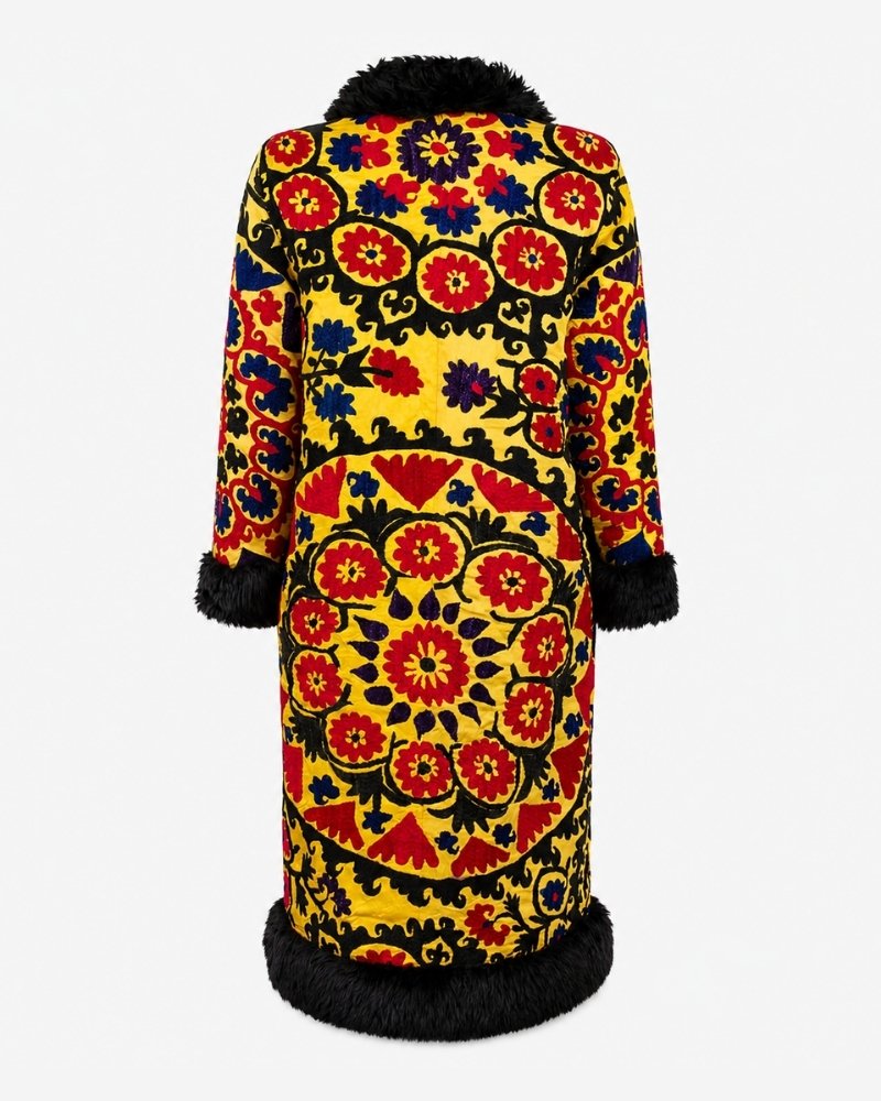 The Afghan Coat Ragna No. 2 by Lunaré – back view flat lay, red and yellow floral medallion pattern with black shaggy shearling collar and cuffs.