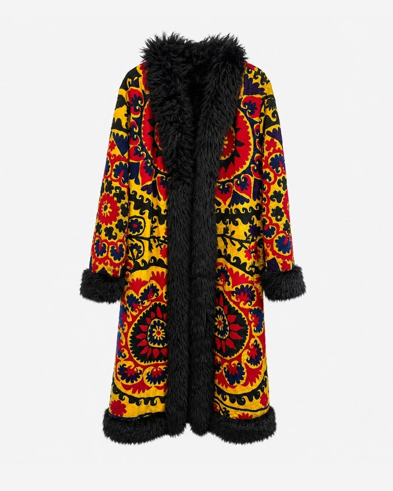 The Afghan Coat Ragna No. 2 by Lunaré – flat lay front view, red and yellow floral medallion pattern with black shaggy shearling collar and cuffs.