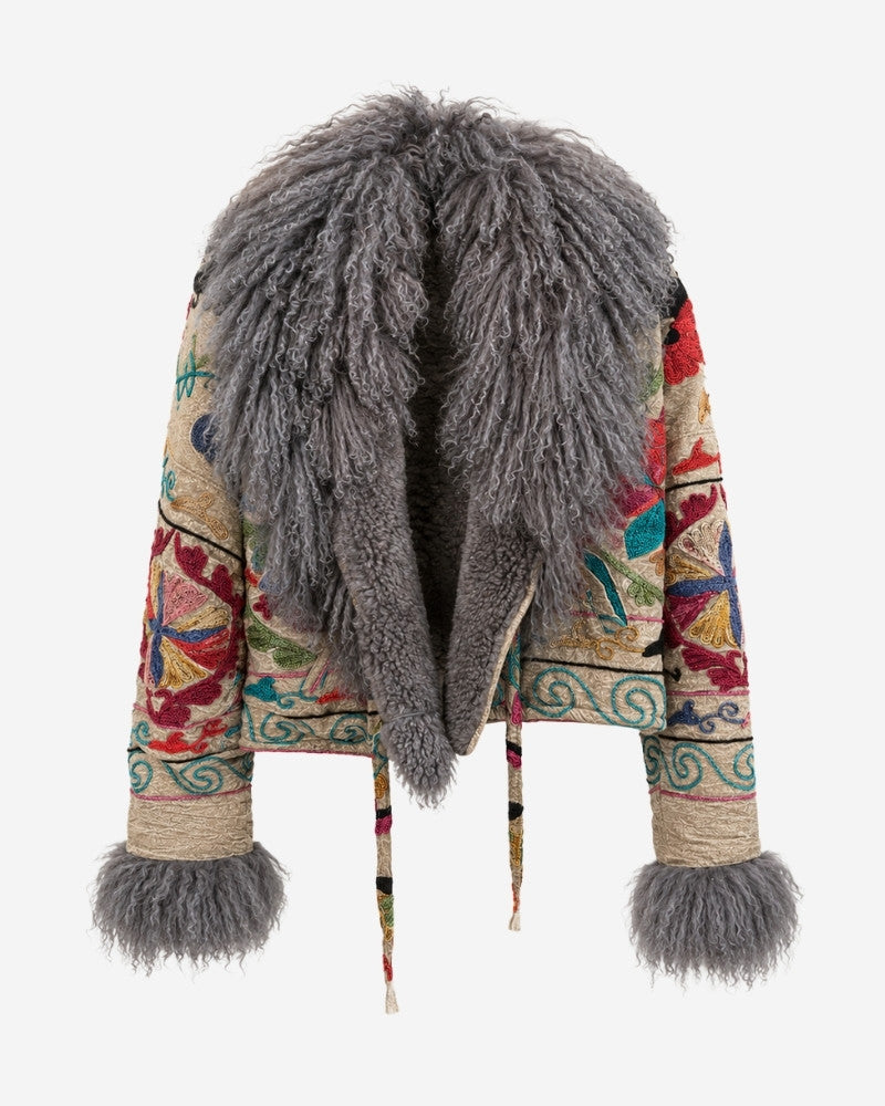 The Afghan Coat Martina No. 3 by Lunaré – front view, tan jacket with vivid multicolor hand embroidery and a grey Tibetan lamb fur collar and cuffs.