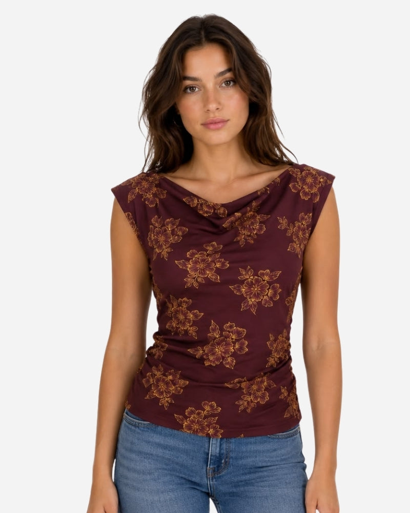 Nube Top 1 by Lunaré – front view on model, burgundy floral print sleeveless top.