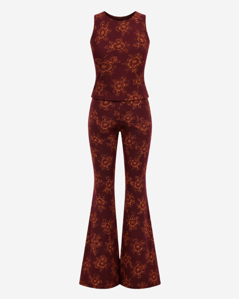 Nube set – Red by Lunaré – sleeveless top and flared trousers in burgundy with orange floral print, viscose-cotton blend.