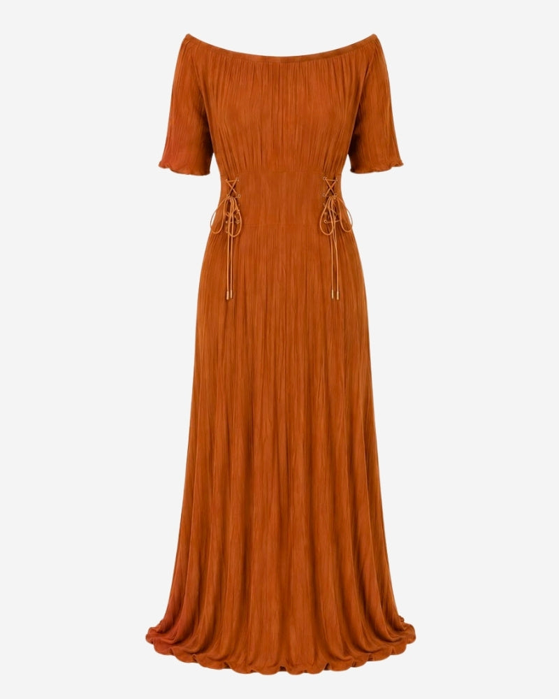 Rose Dress in camel ribbed knit, worn off-shoulder with adjustable side lacing and pearl detail, fluted high-slit hem.