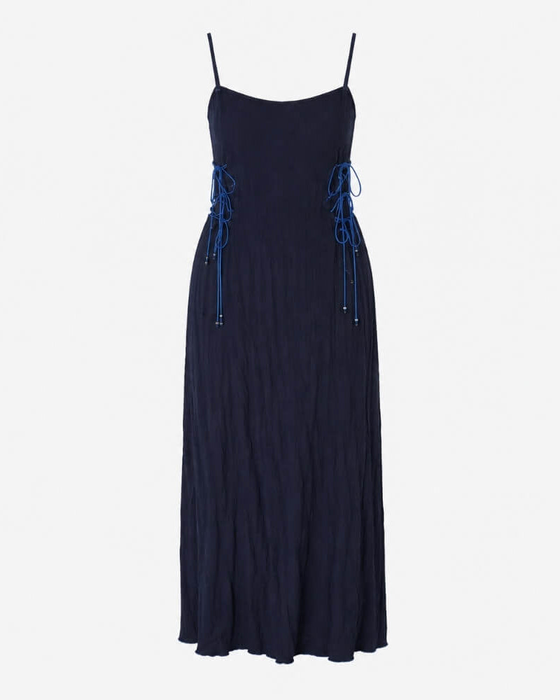 Rose Dress in navy, strap version with adjustable side lacing and a flowing floor-length silhouette.