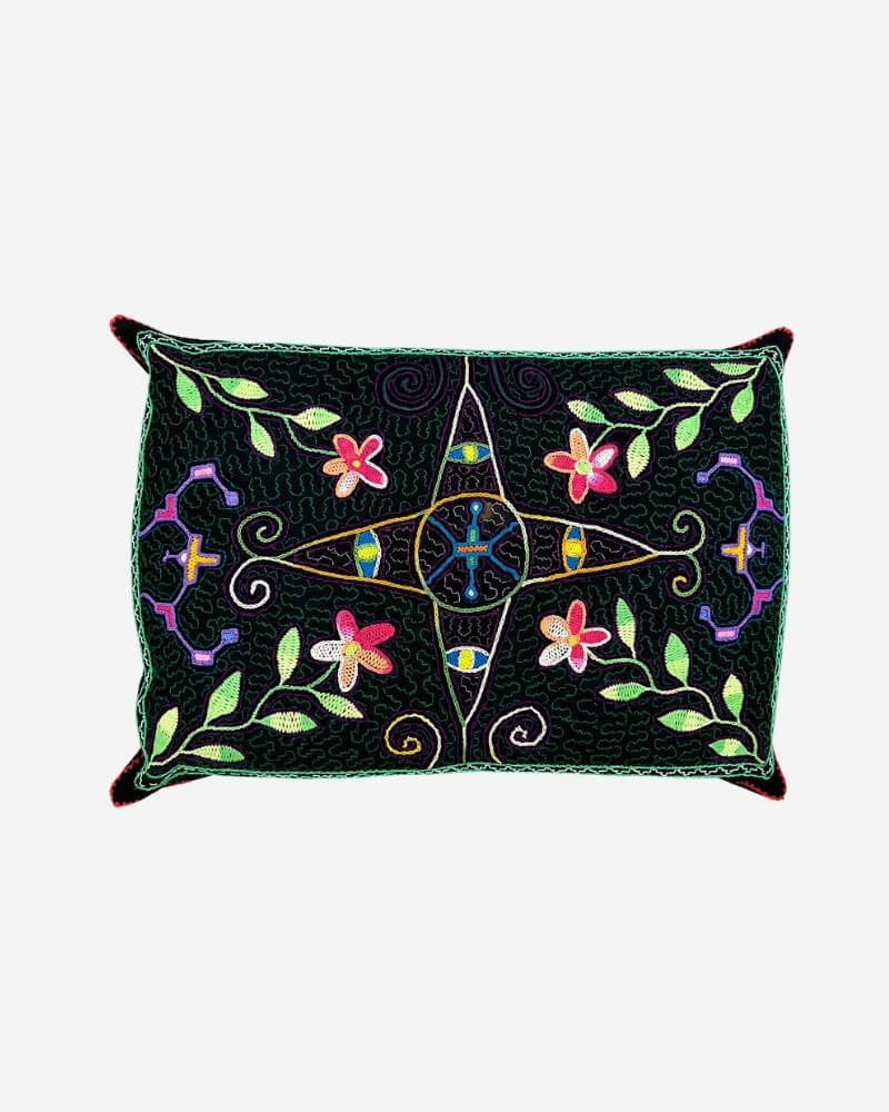 Hand-Embroidered Shipibo Cushion No. 19 in black, with a symmetrical multicolour floral embroidery pattern and vine details.