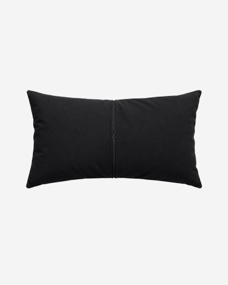 Hand-Embroidered Shipibo Cushion No. 18 by Lunaré – back view, solid black cotton cover.