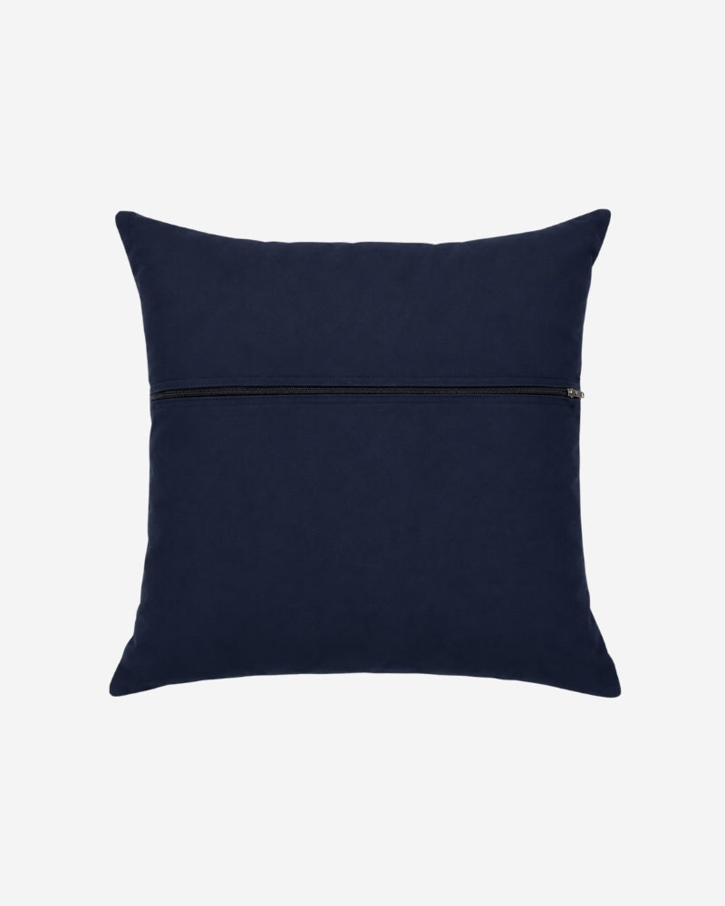 Hand-Embroidered Shipibo Cushion No. 3 by Lunaré – back view, solid navy cotton cover.