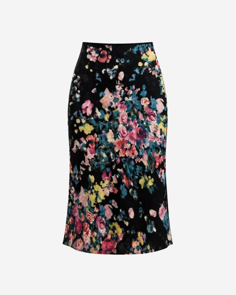 Solita skirt by Lunaré – long black skirt with pink, yellow, and teal floral print.