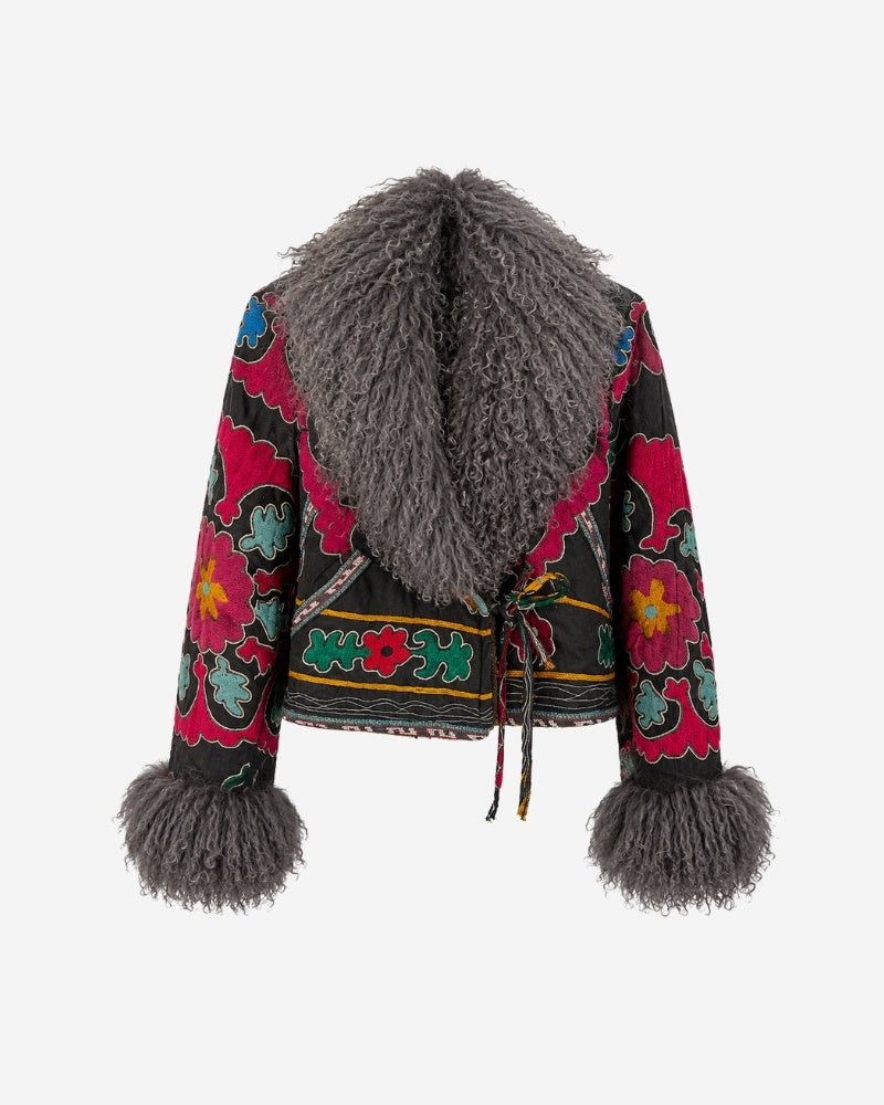 The Afghan Coat Martina No. 5 by Lunaré – front view, black jacket with hand-embroidered red and multicolor floral pattern and a grey Tibetan lamb fur collar and cuffs.