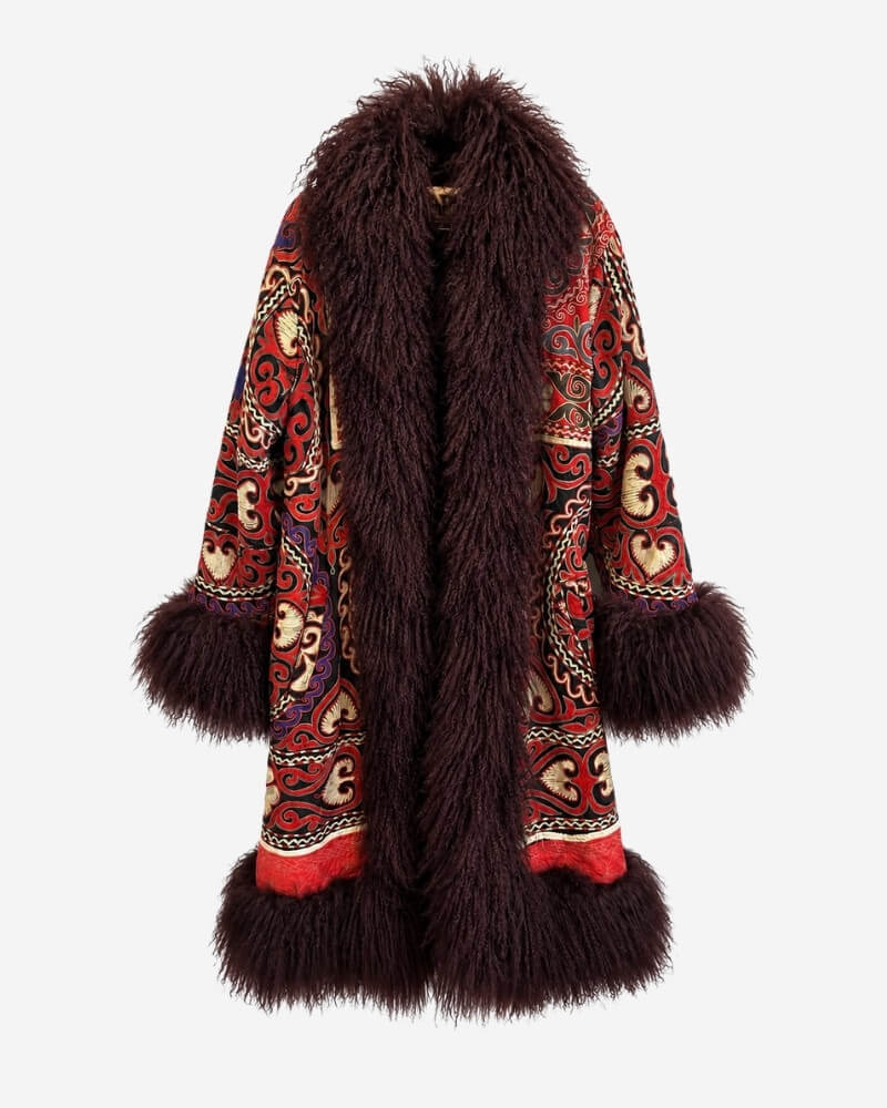 The Afghan Coat Ragna No. 4 by Lunaré – front view, long mid-calf coat with red, black, cream and violet hand-embroidered pattern and deep burgundy shaggy shearling trim.