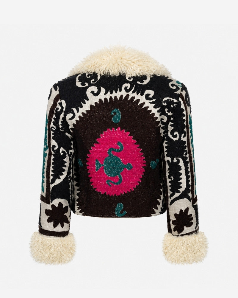 The Afghan Coat Martina No. 1 by Lunaré – back view with a hand-embroidered pink and teal medallion pattern on black, cream shearling collar.