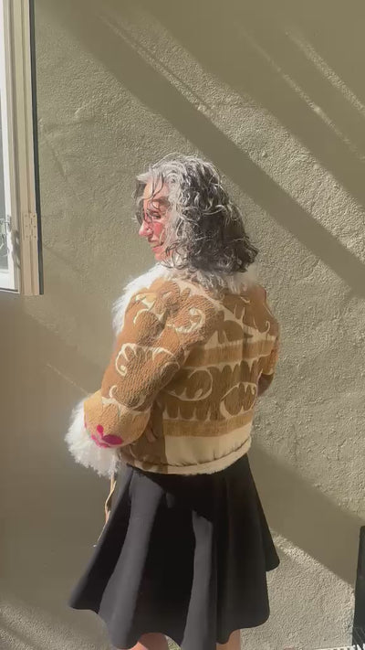 The Afghan Coat Martina No. 10 by Lunaré – product video, lifestyle footage showing pattern and shaggy shearling detail.